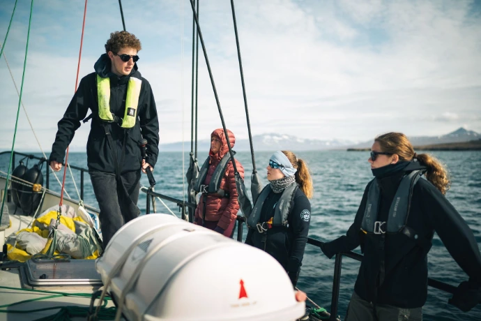 Guests sailing aboard tall ship Saeftinghe during a small-group Arctic adventure
